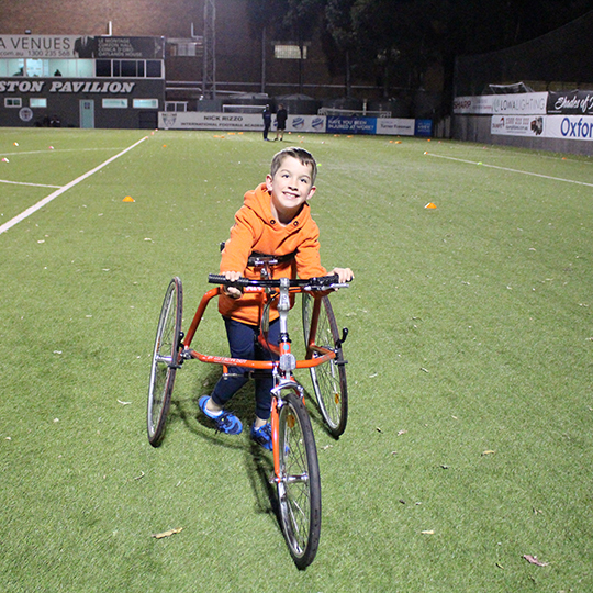 Arren Kieth with his racer bike, which only works on synthetic surfaces